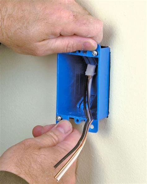 electrical box installation with plastic wings to screw on|electrical box wall installation.